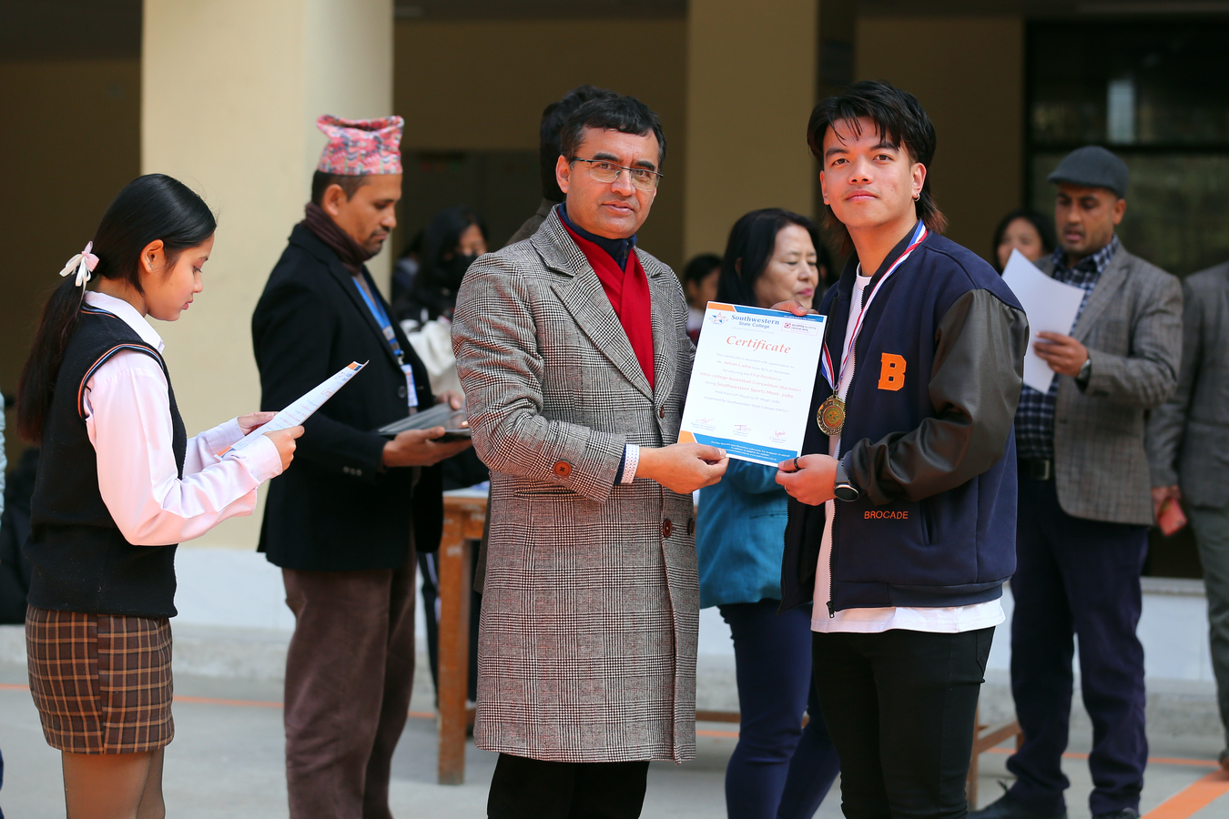 Certificate and medal distribution  
